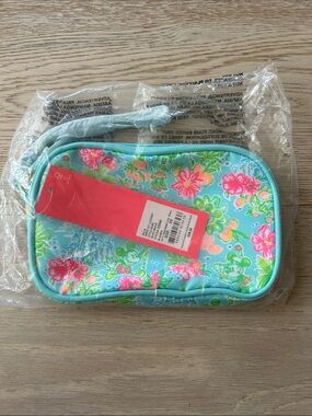 Lilly Pulitzer Disney Aqua Floral Wristlet with Pink Accents